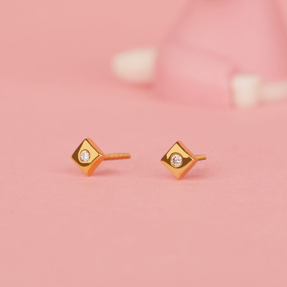 A SCHOOL GIRL'S DIAMOND (YELLOW GOLD) EARRINGS FOR BABY GIRL